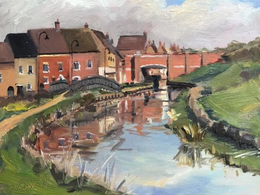 SW17 The Canal and Bridge, Witchelstowe, Swindon. A view of the canal and houses at Wichelstowe, Swindon.